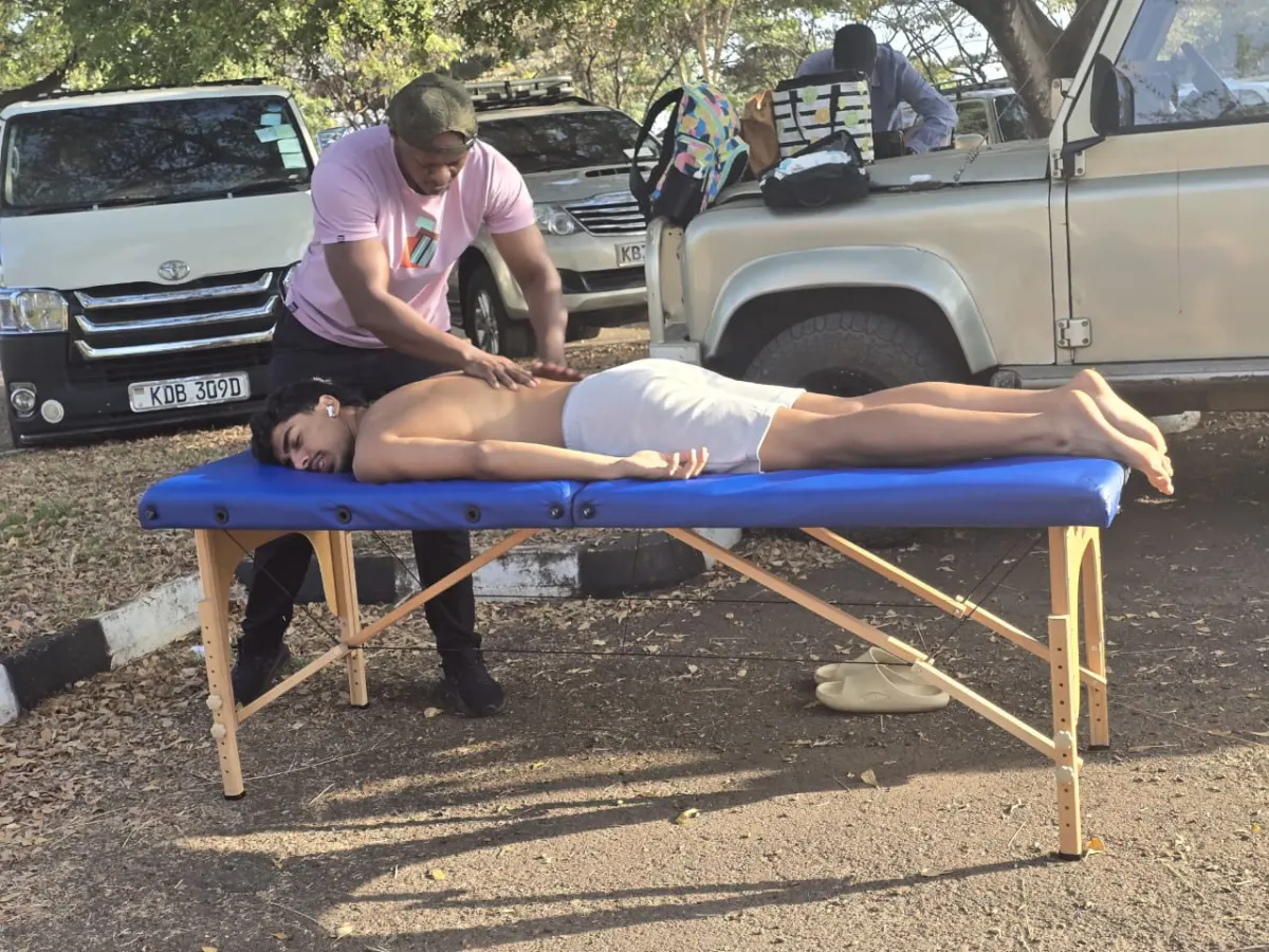 Therapist guiding assisted stretch therapy